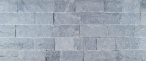 A light gray stone wall