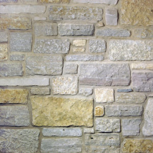 A gray and brown brick wall