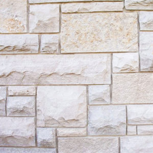 A cream stone wall