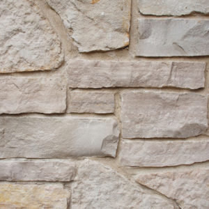 A beige stone wall