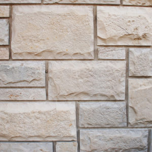 A beige brick wall