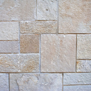 Beige stone tile surface
