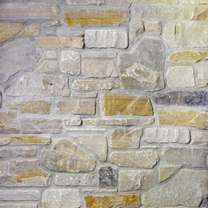 A gray and brown stone wall
