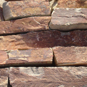 A stack of bronze stone blocks