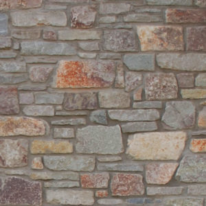 A maroon brick wall