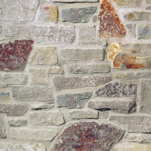 Gray and maroon stone wall