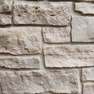 A beige brick wall
