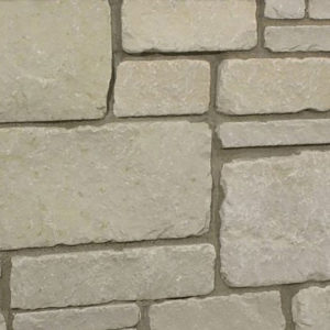 A light brown brick wall